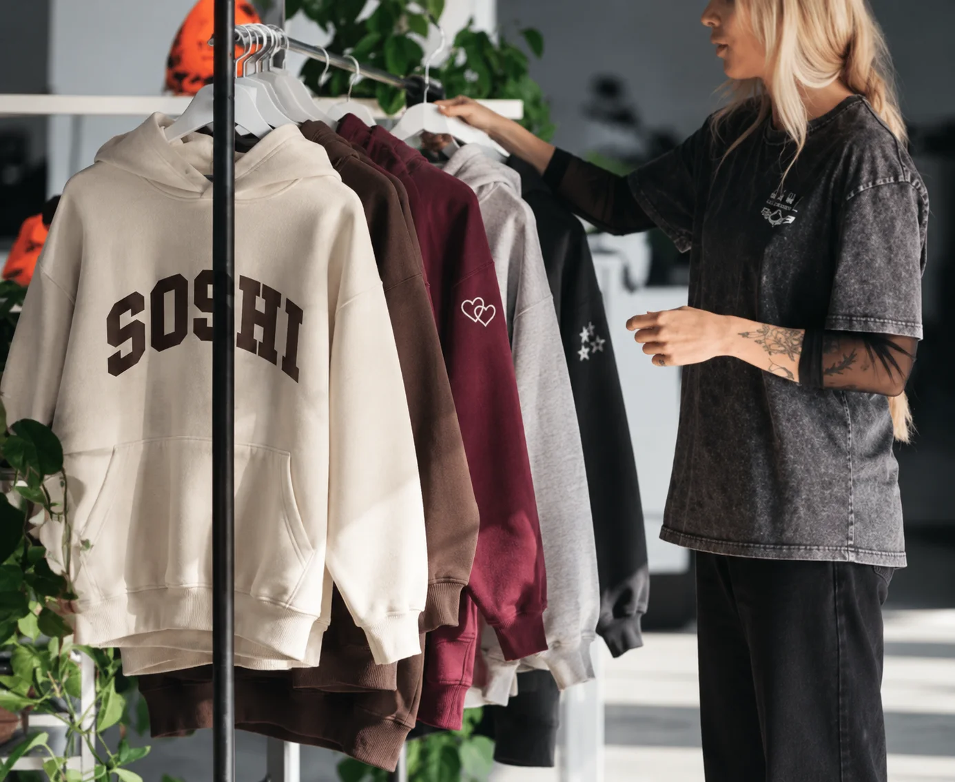 A rack of Soshi hoodies
